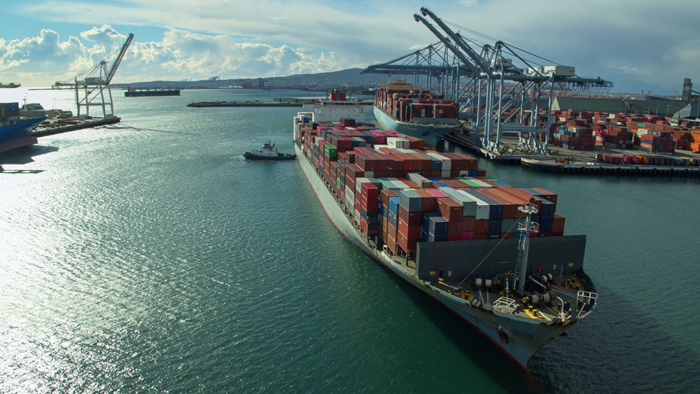 Cargo ships in a ship channel preparing to sail